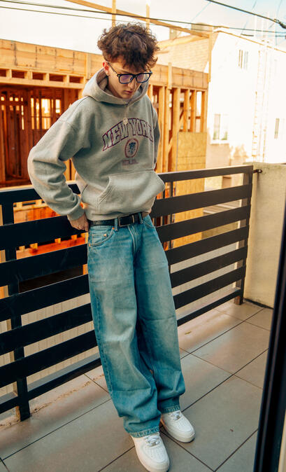 Colin Allen (thatiscolin) in Los Angeles Colin Allen also known as thatiscolin standing on a balcony in Los Angeles capturing lifestyle content